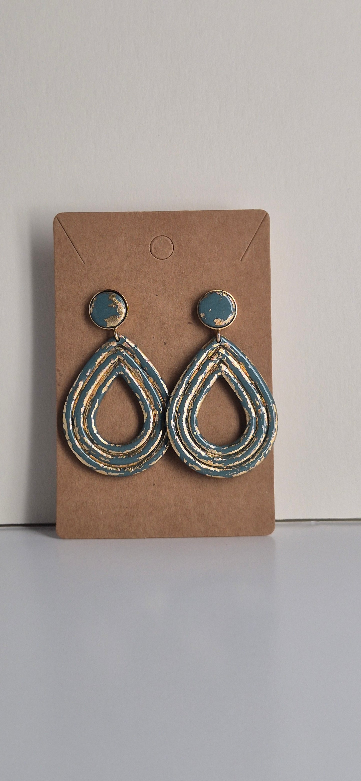 Clou Pendant Goutte bleu et Doré